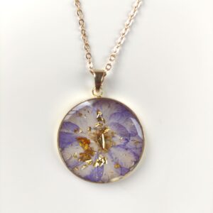 Stainless Steel Necklace with Purple Flower and Gold Accents in Epoxy Resin