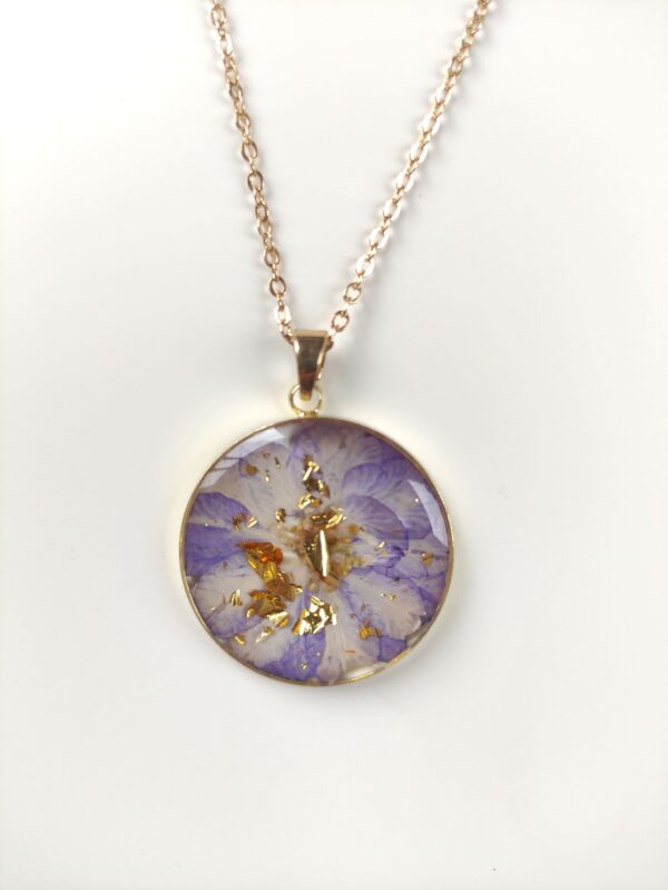 Stainless Steel Necklace with Purple Flower and Gold Accents in Epoxy Resin